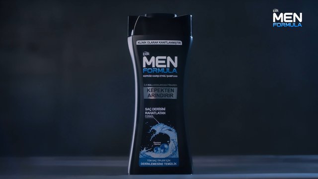 Video Reference: shampoo, bottle, product shot, studio, dark background, cosmetic, hair care, men's product, packaging, label, advertisement, blue, black, isolated, cleaning, dandruff