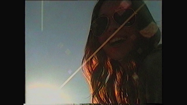 Video Reference: Sky, Beard, Musical instrument, Art, Helmet, String instrument, Heat, Event, Visual arts, Hat