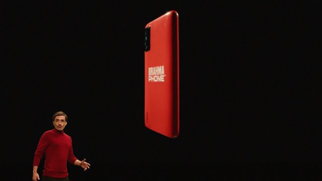 Video Reference: man, stage, smartphone, product render, red, presentation, dark background, technology, concept phone, branding, speaker