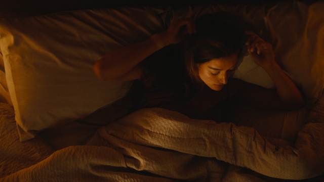 Video Reference: Hand, Hairstyle, Arm, Comfort, Human body, Textile, Neck, Flash photography, Wood, Finger