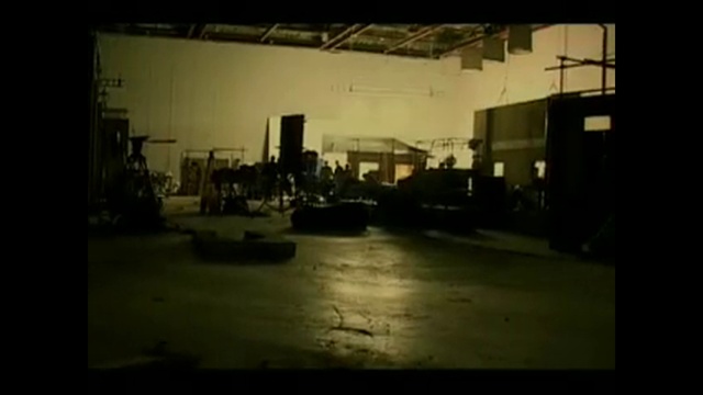 Video Reference: Tints and shades, Rectangle, Darkness, Art, Font, City, Building, Event, Monochrome photography, Room