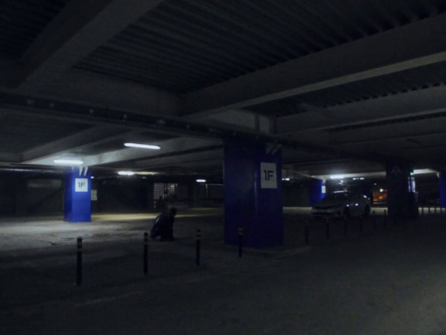 Video Reference: Sky, Asphalt, Parking, Gas, Automotive lighting, Tints and shades, Midnight, Parking lot, City, Electricity