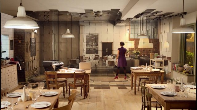 Video Reference: restaurant, dining room, interior, tables, chairs, pendant lights, woman, purple dress, wooden floor, set table, cafe, warm lighting, modern decor, mirror wall, empty room