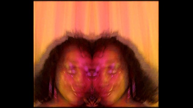Video Reference: abstract, mirrored, face, portrait, distorted, symmetry, pink, orange, color effect, close-up, human, artistic, glitch, surreal