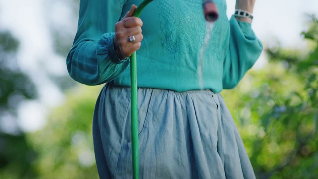 Video Reference: Hand, Outerwear, Azure, Dress, Sleeve, Gesture, Grass, People in nature, Street fashion, Happy