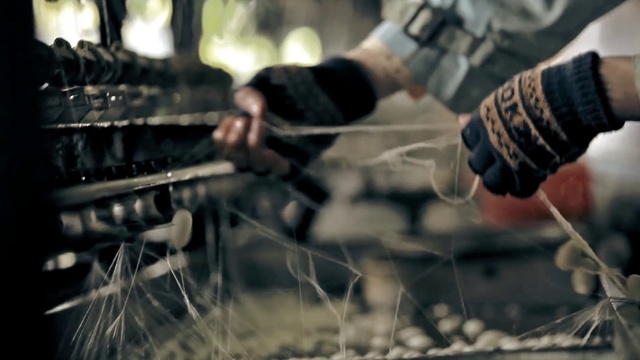 Video Reference: Hand, Shoe, Bicycle tire, Gesture, Finger, Automotive tire, Street fashion, Human leg, Cooking, Grass