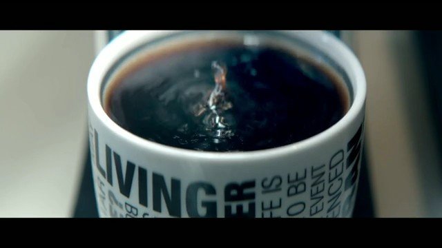 Video Reference: coffee, mug, cup, close-up, drink, splash, liquid, dark coffee, kitchen, beverage
