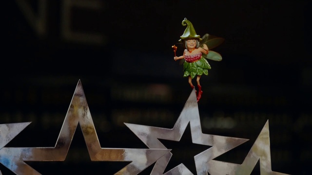 Video Reference: Toy, Hat, Window, Fictional character, Font, Triangle, Event, Flag, Carmine, Flag of the united states