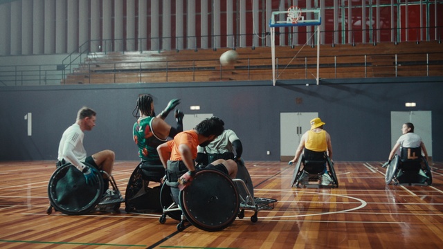 Video Reference: Wheelchair sports, Field house, Wheelchair basketball, Player, Sports gear, Wheelchair, Disabled sports, Ball game, Sports equipment, Wood