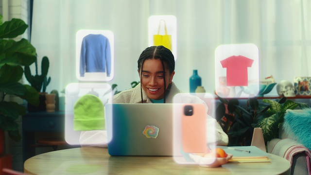 Video Reference: Smile, Green, Personal computer, Computer, Table, Fashion, Desk, Interior design, Plant, Laptop