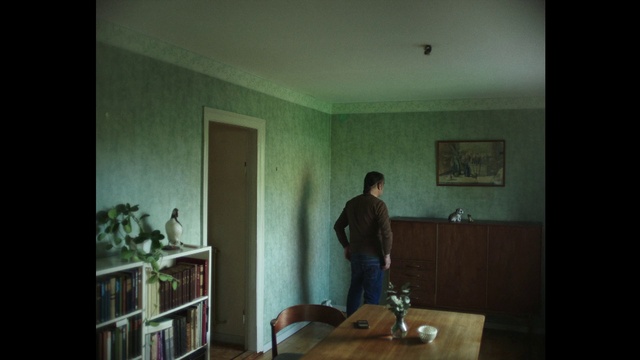 Video Reference: Table, Property, Furniture, Picture frame, Building, Wood, Interior design, Bookcase, Paint, Floor