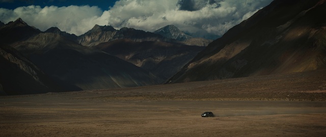 Video Reference: Cloud, Sky, Mountain, Tree, Terrain, Slope, Grassland, Plain, Mountainous landforms, Grass