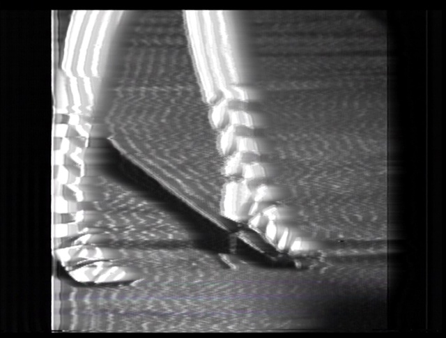 Video Reference: Font, Monochrome, Monochrome photography, Human leg, Metal, Audio equipment, Still life photography, Fashion accessory, Shadow, Kitchen utensil