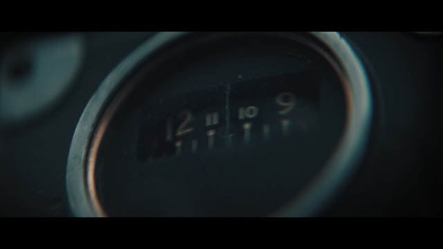 Video Reference: Automotive lighting, Font, Gas, Circle, Electric blue, Vehicle, Auto part, Darkness, Automotive design, Macro photography