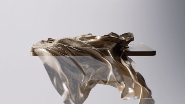 Video Reference: smartphone, mobile phone, gold, fabric, cloth, draped, abstract, product shot, minimal background, studio, luxury, technology, sleek, close-up