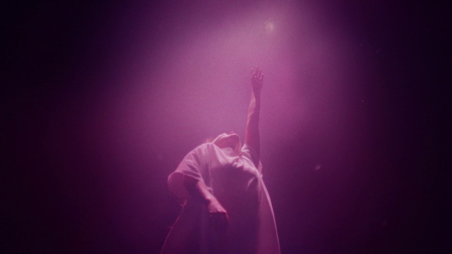 Video Reference: Hand, Microphone, Arm, Purple, Human body, Musician, Entertainment, Concert, Flash photography, Sky