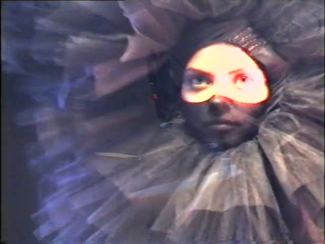 Video Reference: Hair, Eyebrow, Jaw, Beard, Art, Headgear, Eyelash, Cg artwork, Electric blue, Magenta