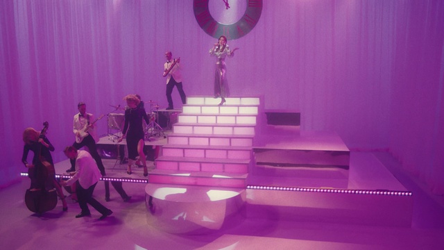 Video Reference: Purple, Decoration, Table, Lighting, Interior design, Entertainment, Violet, Pink, Magenta, Performing arts
