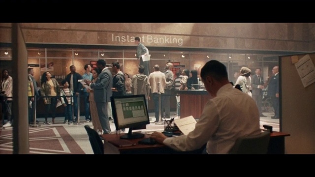 Video Reference: Computer monitor, Computer, Personal computer, Audio equipment, Event, Computer keyboard, Suit, Gadget, Chair, Display device