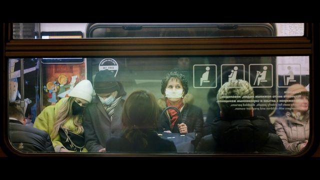 Video Reference: Train, Jacket, Cool, Headgear, Motor vehicle, Public transport, Display device, Passenger, Electronic device, Font