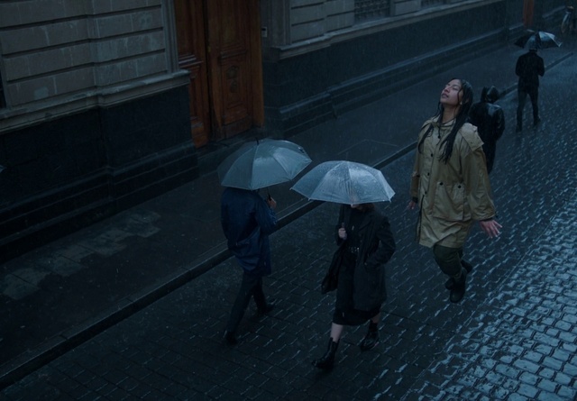 Video Reference: Umbrella, Road surface, Grey, Asphalt, Headgear, Sidewalk, Tints and shades, Midnight, Precipitation, Road