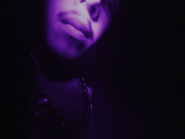 Video Reference: Lip, Purple, Human body, Eyelash, Flash photography, Violet, Entertainment, Chest, Performing arts, Magenta
