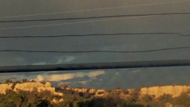 Video Reference: Cloud, Sky, Atmosphere, Ecoregion, Overhead power line, Electricity, Dusk, Cumulus, Sunset, Landscape