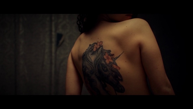 Video Reference: Shoulder, Neck, Sleeve, Flash photography, Eyelash, Tattoo, Elbow, Trunk, Chest, Human leg
