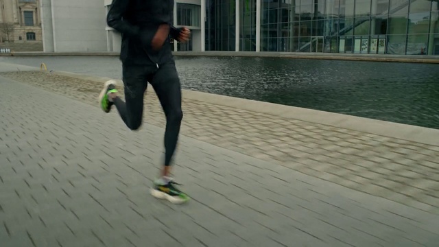 Video Reference: Footwear, Water, Leg, Road surface, Knee, Asphalt, Rolling, Sidewalk, Walking shoe, Human leg