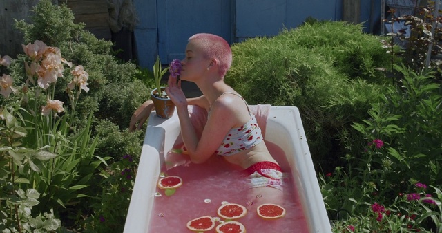 Video Reference: Plant, Pink, Grass, Summer, Leisure, Eyewear, Fun, Chest, Sunglasses, Swimwear