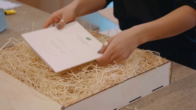 Video Reference: Wood, Packing materials, Rectangle, Event, Nail, Paper, Paper product, Science, Grass, Font