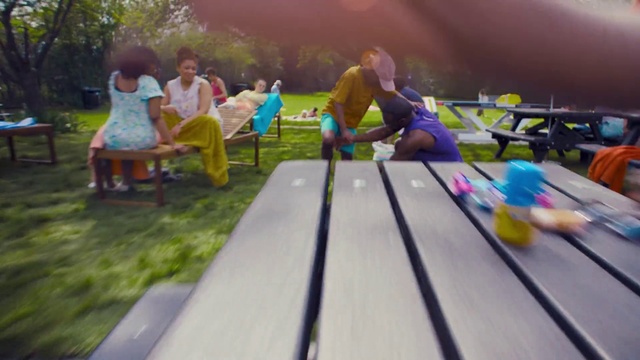 Video Reference: Shorts, Plant, Tree, Outdoor recreation, Grass, Leisure, Public space, Fun, Wood, Recreation