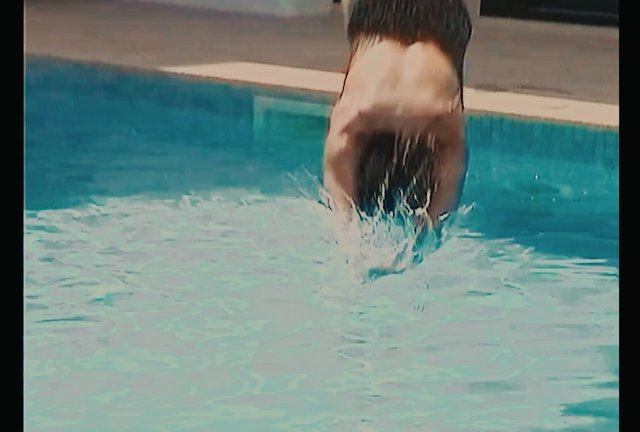 Video Reference: swimming pool, diving, dive, splash, water, person, action, sports, outdoor, summer, recreation