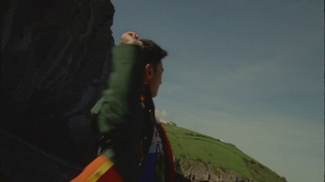 Video Reference: Sky, Travel, Grass, People in nature, Landscape, Grassland, Flag, Recreation, Soldier, Hill