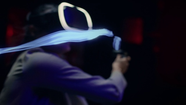 Video Reference: Purple, Gesture, Entertainment, Electric blue, Magenta, Event, Performing arts, Darkness, Smoke, Visual effect lighting