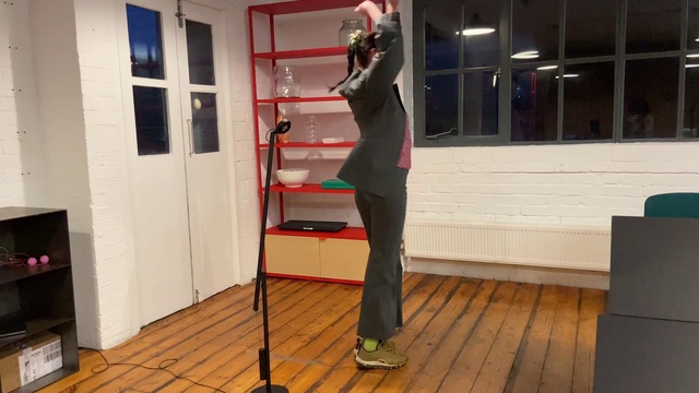 Video Reference: Wood, Standing, Door, Flooring, Interior design, Waist, Floor, Hardwood, Laminate flooring, Performing arts