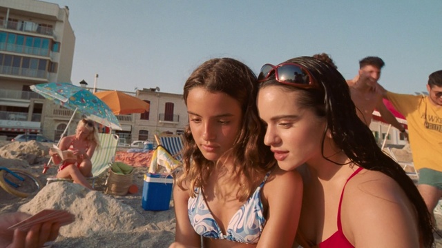 Video Reference: Sky, Goggles, People on beach, Swimsuit top, Lingerie top, Brassiere, Body of water, Sunglasses, Swimwear, Happy