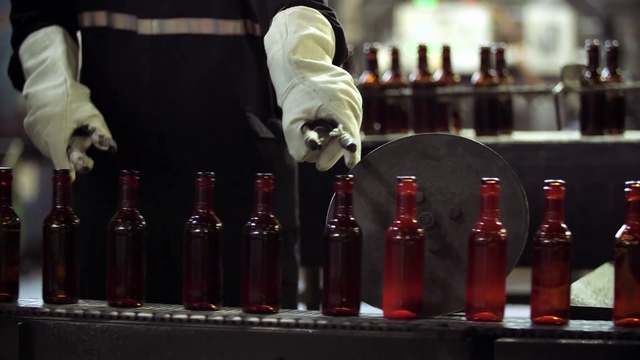 Video Reference: Bottle, Drinkware, Drinking establishment, Product, Barware, Glass bottle, Liquid, Alcoholic beverage, Drink, Wood