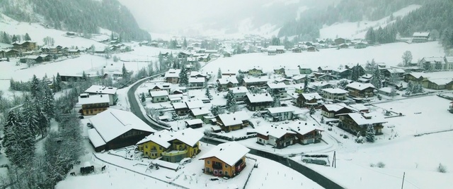Video Reference: Building, Snow, Mountain, Nature, House, Urban design, Atmospheric phenomenon, Sky, Water, Landscape