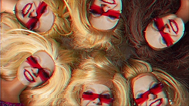 Video Reference: Facial expression, Art, Red, Pattern, Beauty, Eyewear, Event, Fun, Close-up, Circle
