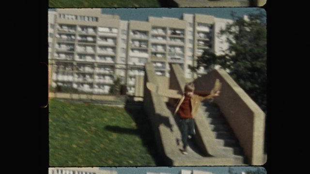 Video Reference: Rectangle, Gesture, Font, Urban design, Tints and shades, Grass, Wood, Art, Room, Screenshot