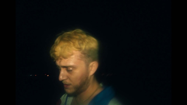 Video Reference: Jaw, Flash photography, T-shirt, Space, Midnight, Fun, Event, Electric blue, Artist, Darkness