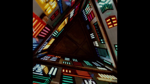 Video Reference: Building, Stained glass, Font, Tints and shades, Triangle, Symmetry, Glass, Signage, Machine, Games
