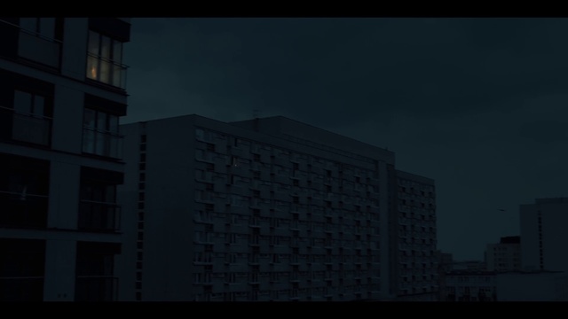Video Reference: Building, Sky, Window, Grey, Tower block, Urban design, Condominium, Atmospheric phenomenon, City, Facade
