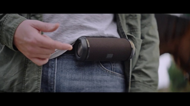 Video Reference: Hand, Sleeve, Gesture, Collar, Finger, Street fashion, Wrist, Gadget, Blazer, Thumb