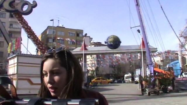 Video Reference: Sky, Lighting, Building, Sunglasses, Travel, Leisure, City, Fun, Eyewear, Tree