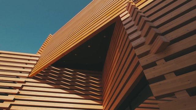 Video Reference: Sky, Wood, Shade, Architecture, Rectangle, Fixture, Material property, Siding, Composite material, Building material