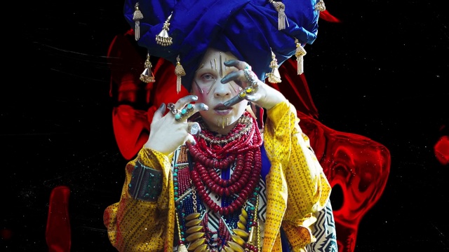 Video Reference: Temple, Performing arts, Entertainment, Event, Fashion design, Hat, Tradition, Art, Costume design, Costume