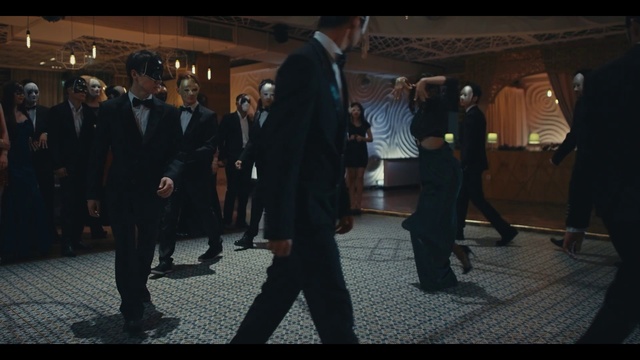 Video Reference: Suit trousers, Coat, Gesture, Suit, Blazer, Formal wear, White-collar worker, Event, Tie, Chair