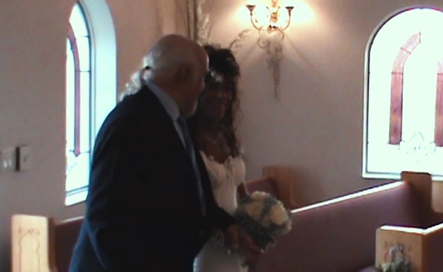 Video Reference: Window, Suit, Event, Formal wear, Religious institute, Rite, Chapel, Light fixture, Room, Sconce